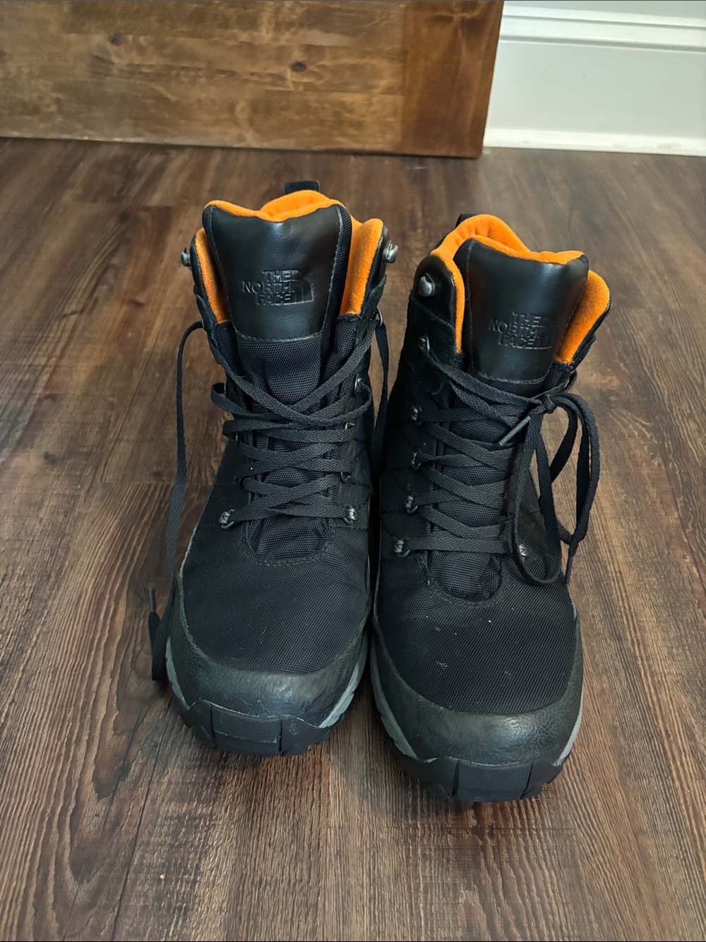 The North Face Men's Black Boots with Orange Collar